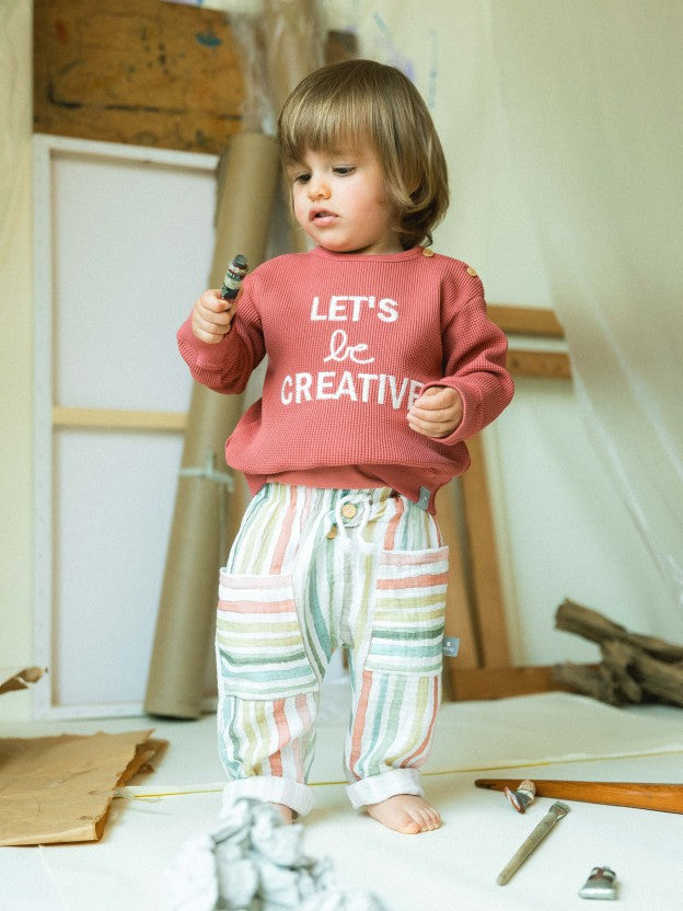 Sudadera ¨Seamos creativos¨ coral Snug