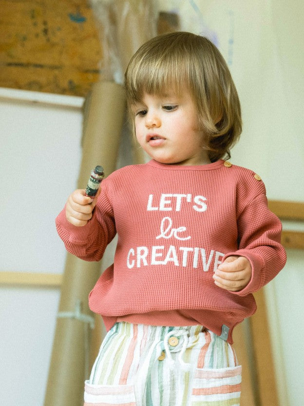 Sudadera ¨Seamos creativos¨ coral Snug