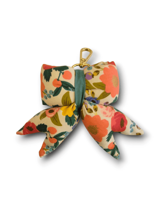 Llavero flores beige Mini and co